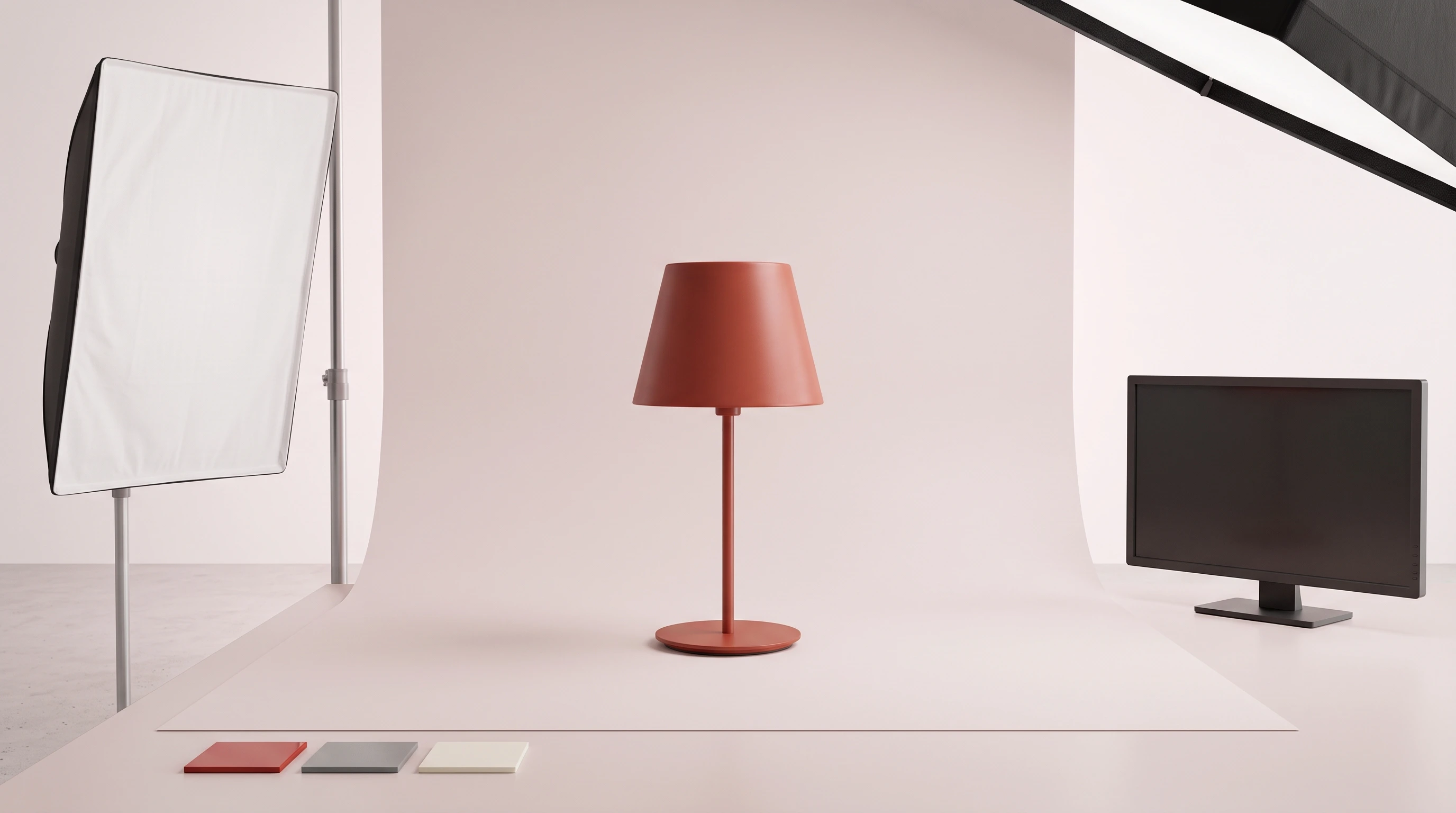 Sculpted desk lamp lit on a studio sweep